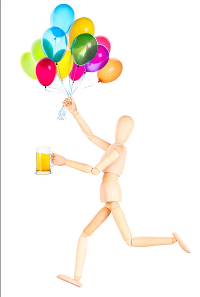 Wooden Dummy with beer and balloons — Stock Photo, Image