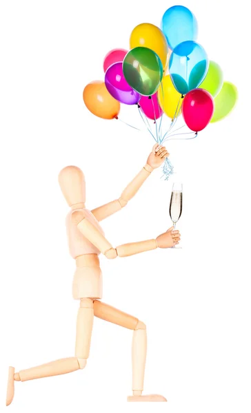 Mannequin en bois avec ballons à champagne — Photo