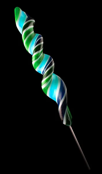 Bright colorful lollipop over black background — Stock Photo, Image