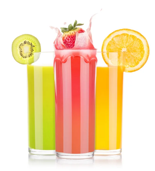 Tasty summer fruit drinks in glass with splash — Stock Photo, Image