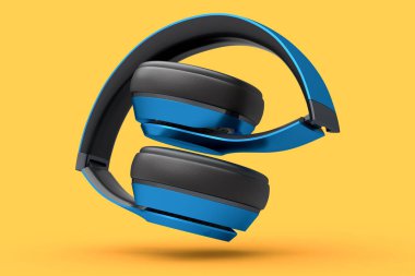 Oyun kulaklıkları ve müzik ekipmanları kavramı turuncu arka planda izole edilmiş.