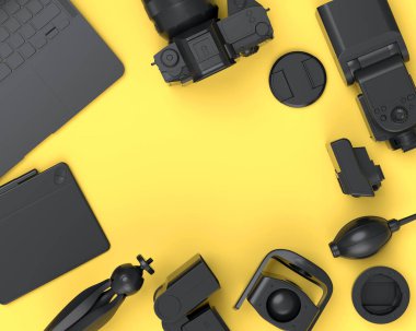 Monokrom tasarımcı çalışma alanının en üst görüntüsü ve dizüstü bilgisayar, tablet, dijital kamera ve sarı arka planda spidlight flaş gibi teçhizatlar. İllüstratör ve fotoğrafçılık araçları için 3d aksesuar hazırlayıcı