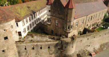 Close-up view of the old historic Stettenfels Castle surrounded by green blooming vineyards in Weinsberg town, Heilbronn district in Germany