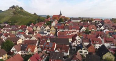 Flying copter over the beautiful rural town Weinsberg near the Burgruine Weibertreu in Heilbronn, Germany. 4k footage