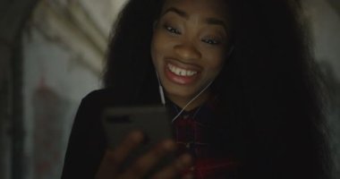 Portrait Young Beautiful Happy African Girl Smiling Reading Sms Texting Mobile Outdoor 4k One Alone Emotional