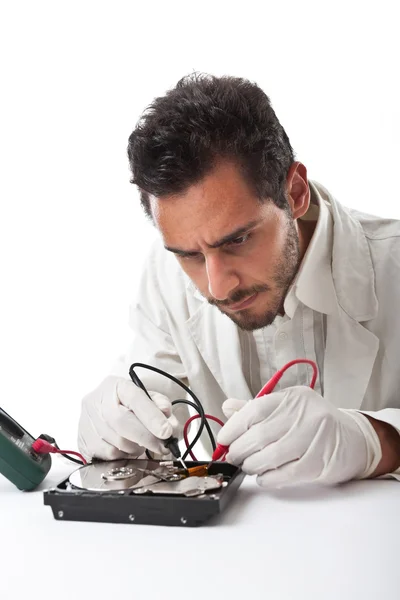 Technician and hard disk — Stock Photo, Image