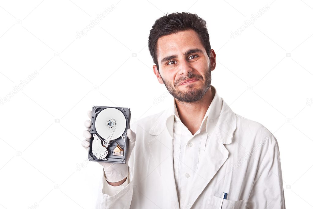 Technician showing hard disk