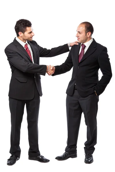 Dos hombres de negocios estrechando las manos — Foto de Stock