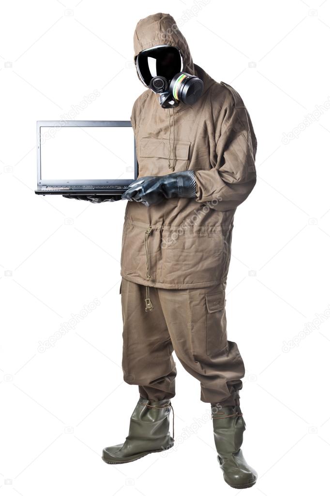 Man in Hazard Suit holding a laptop