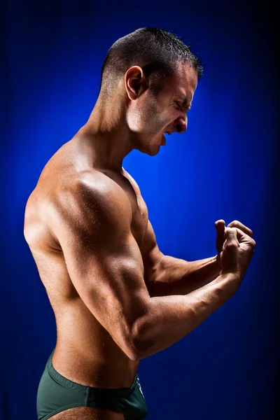 Flexing muscles — Stock Photo, Image