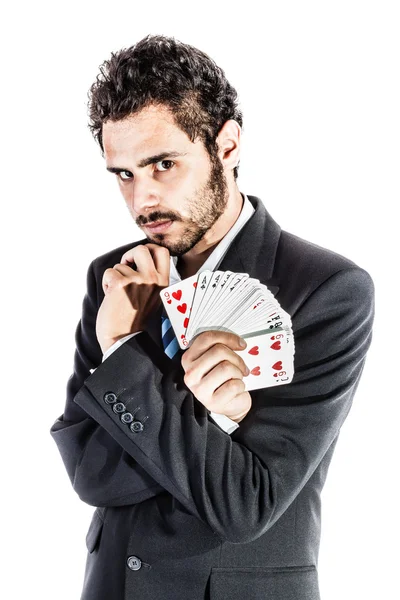 Бизнесмен с игральными картами — стоковое фото