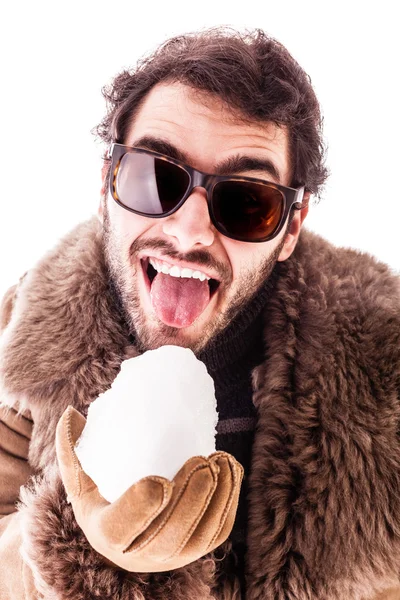 Licking a snowball — Stock Photo, Image
