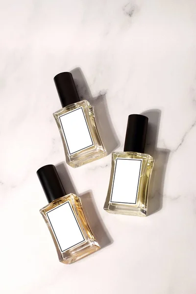 Three Glass Perfume Bottles Mockup Marble Background — Stock fotografie