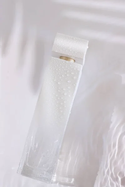 White Perfume Bottle Water Palm Shade — ストック写真