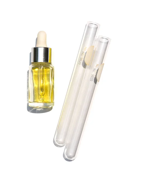 Yellow Cosmetic Liquid Oil Dropper Bottle Place Next Test Tube — Stock Photo, Image