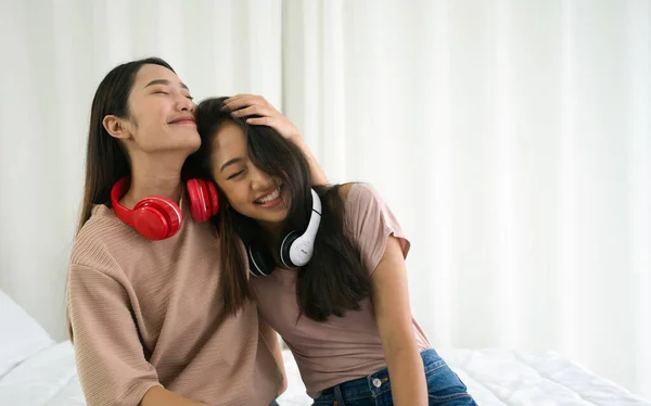 Young Asian Teen Her Friend Headphones Smile Happily While Sitting — Fotografia de Stock