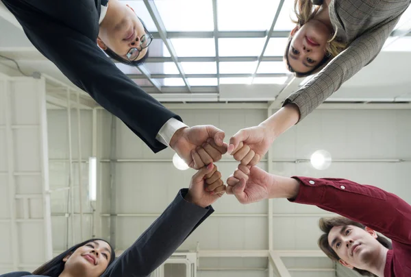 Team Building Concept Coworkers Standing Circle Bumping Fist Together Celebrating — Foto de Stock