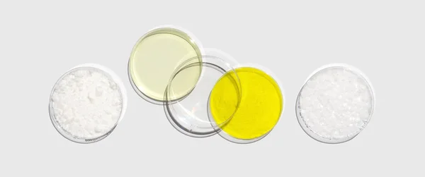 白い実験台の上のペトリ皿にセチルエステルワックス ポリアルミニウム塩化物液体 クロム酸カリウムおよびマイクロ結晶ワックス 化粧品やトイレタリー用品の化学成分 トップ表示 — ストック写真