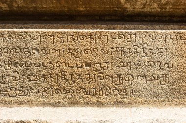 Ancient Kannada letters on stone, Lakshmanlingeshwara Temple, Avani, Kolar, Karnataka, India clipart