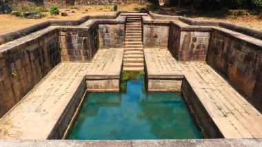 Old water bath at Kavaledurga Fort, Shimoga, Karnataka, India clipart
