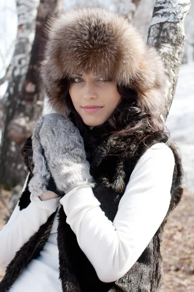 Young sexy woman in the early spring on the background of birch — Stock Photo, Image