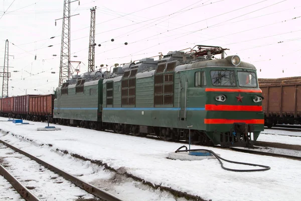 Soviet locomotive pulling freight wagons — Stock Photo, Image