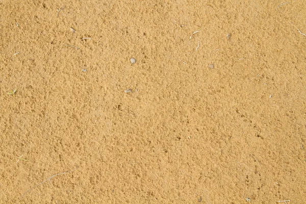 Фон из желтого песка — стоковое фото