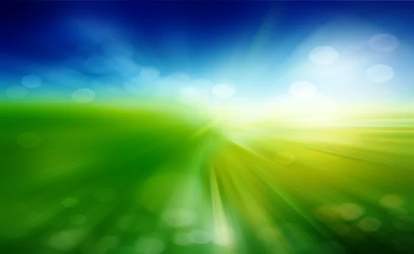 Grünes Feld und blauer Himmel mit weißen Wolken — Stockfoto