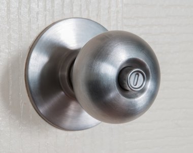 Close up shot of stainless steel round ball Door knob clipart