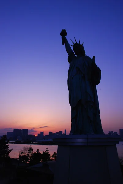 Replica statue of liberty at dusk Stock Picture