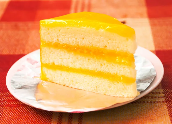Rebanada de pastel de queso naranja —  Fotos de Stock