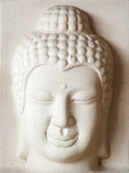 Escultura de yeso tallada en la cara de Buda — Foto de Stock