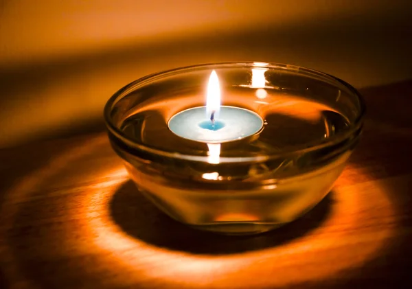 Burning candle light background — Stock Photo, Image