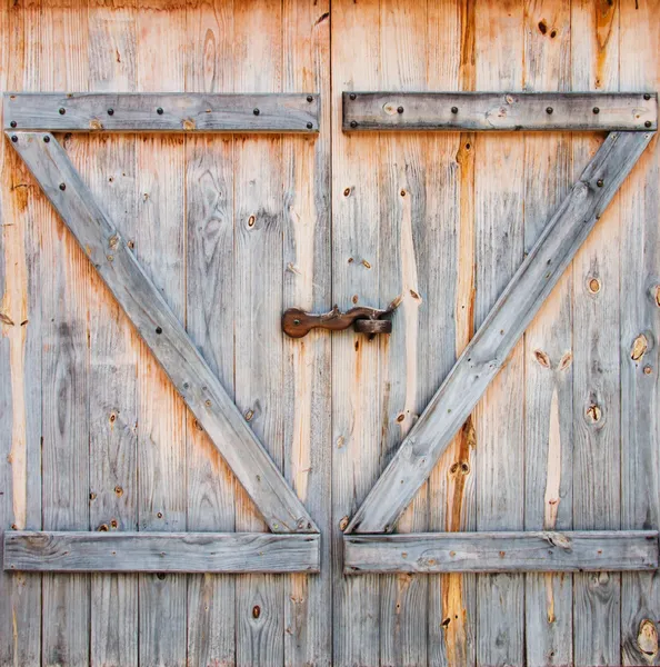 Detalj av trä ladugårdsdörr — Stockfoto