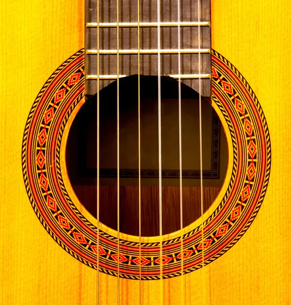 Close-up of sound hole of classic guitar — Stock Photo, Image