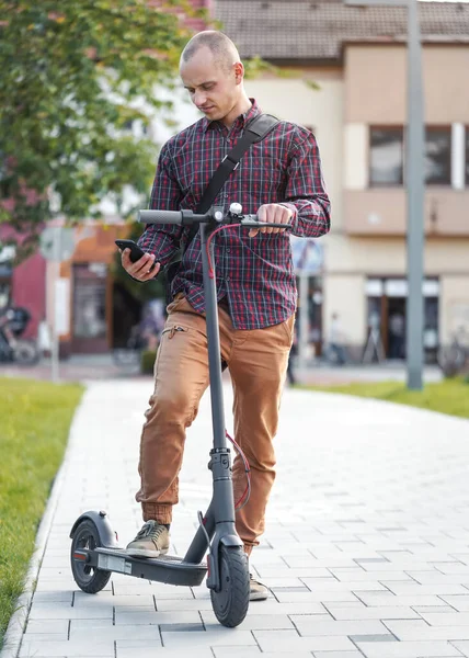 Young Man Casual Trousers Shirt Standing Next His Electric Scooter — Φωτογραφία Αρχείου