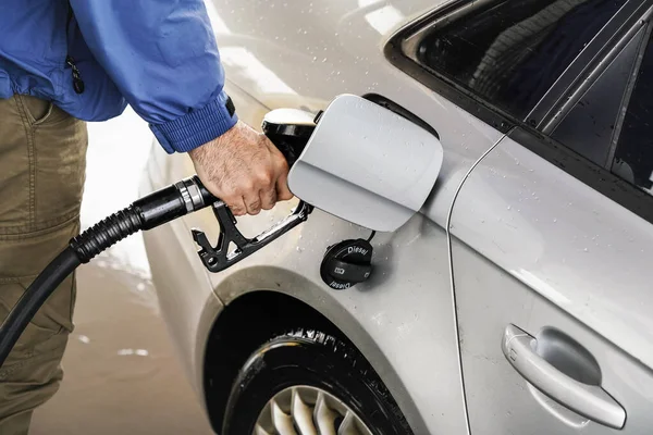 Man Holding Fuel Nozzle Filling Gas Tank Diesel Car Covered — Stock Fotó