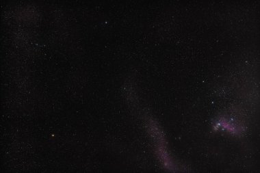 Winter night sky at Orion constellation, Messier 42 nebula in right down corner, bright yellow Betelgeuse star left side and blue Bellatrix above clipart