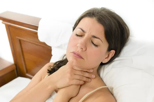 Woman having sore throat — Stock Photo, Image