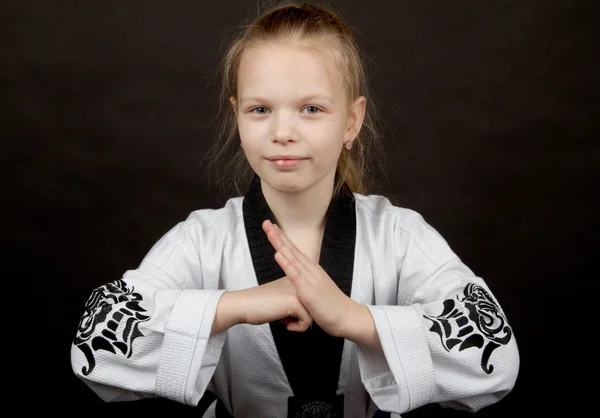 Young girl in kimono bowing — Stock Photo, Image