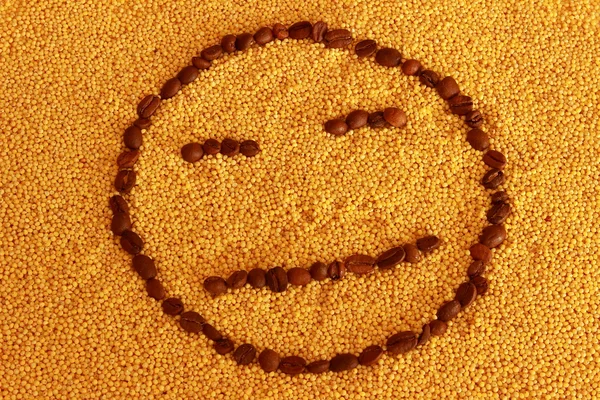 Smiley on millet — Stock Photo, Image