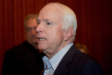 Senator John McCain appears at a town hall meeting in Mesa, Ariz clipart