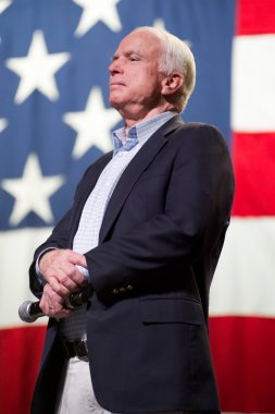Senator John McCain appears at a town hall meeting in Mesa, Ariz clipart
