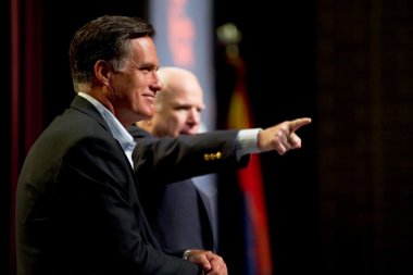 Mitt Romney and Senator John McCain appear at a town hall meetin clipart