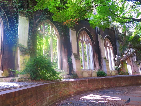 Old abandoned castle building in London, England, UK. London city hidden places. St. Dunstan in the East Church Garden