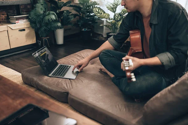 Young Man Relax Playing Guitar While Sitting Sofa Bed Living — Photo