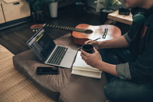 Young Man Relax Playing Guitar While Sitting Sofa Bed Living — Foto de Stock