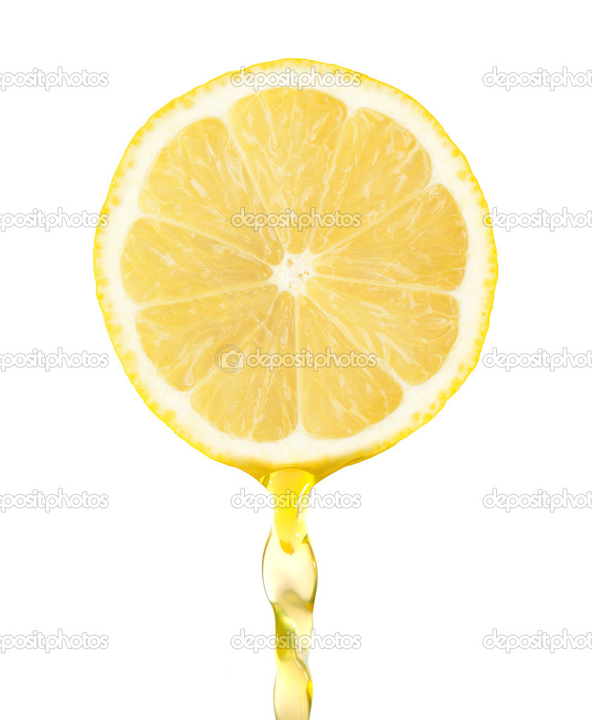 Fragment of lemon with water drops on the white background
