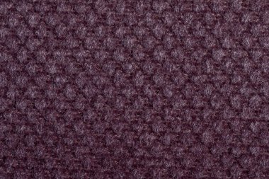 Gri kumaş dokusu. Mobilya döşeme tekstili. Kabartmalı desen. Dokuma iplikleri. Malzeme yumuşak dokunuşlu. Minimalizm kavramı. Arkaplan ya da duvar kağıtları için yüksek detaylı makro fotoğrafçılık.