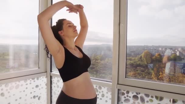 Young Pregnant Woman Doing Stretching Standing Yellow Exercise Mat Home — ストック動画